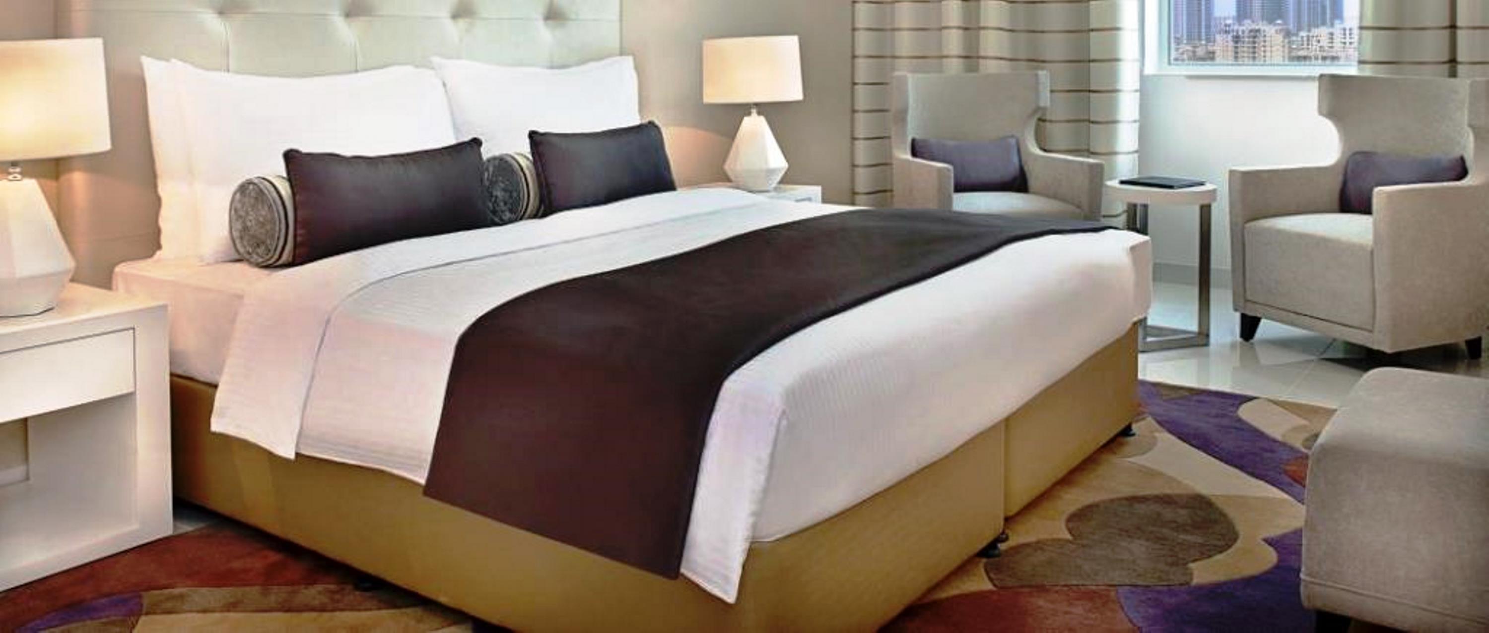 Damac Maison Cour Jardin Dubai Exterior photo A bed runner
