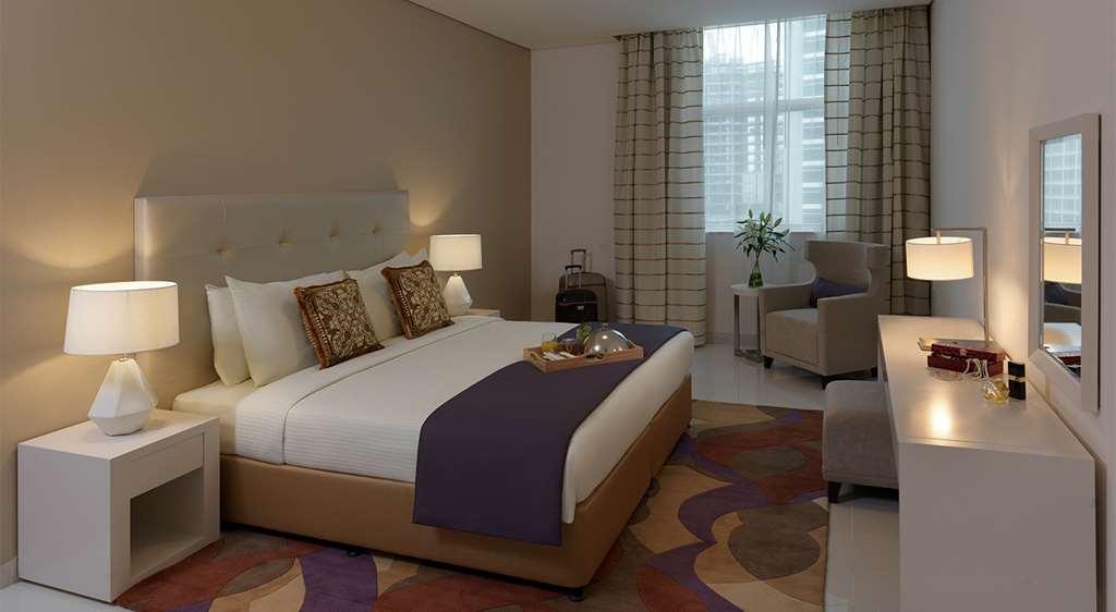 Damac Maison Cour Jardin Dubai Room photo A bedroom in the hotel