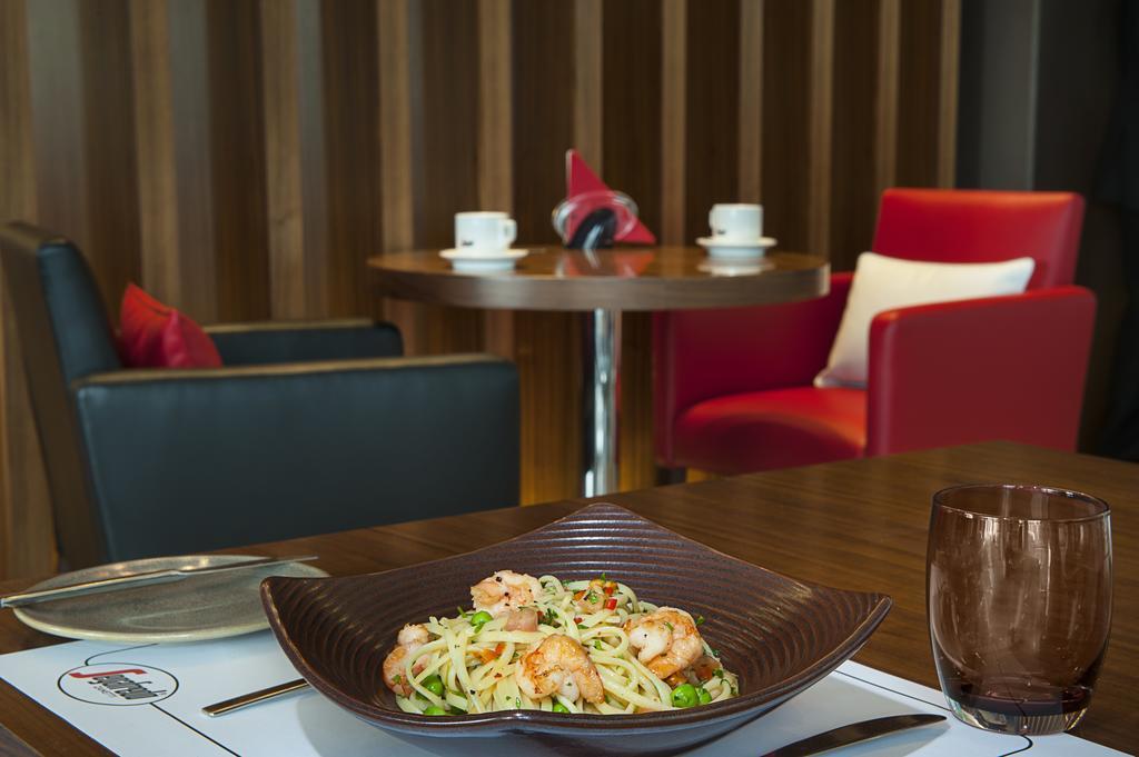 Damac Maison Cour Jardin Dubai Exterior photo A meal at the lounge