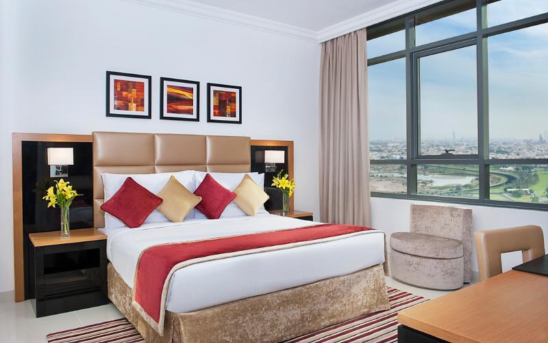 Damac Maison Cour Jardin Aparthotel Dubai Exterior photo A bedroom at the hotel