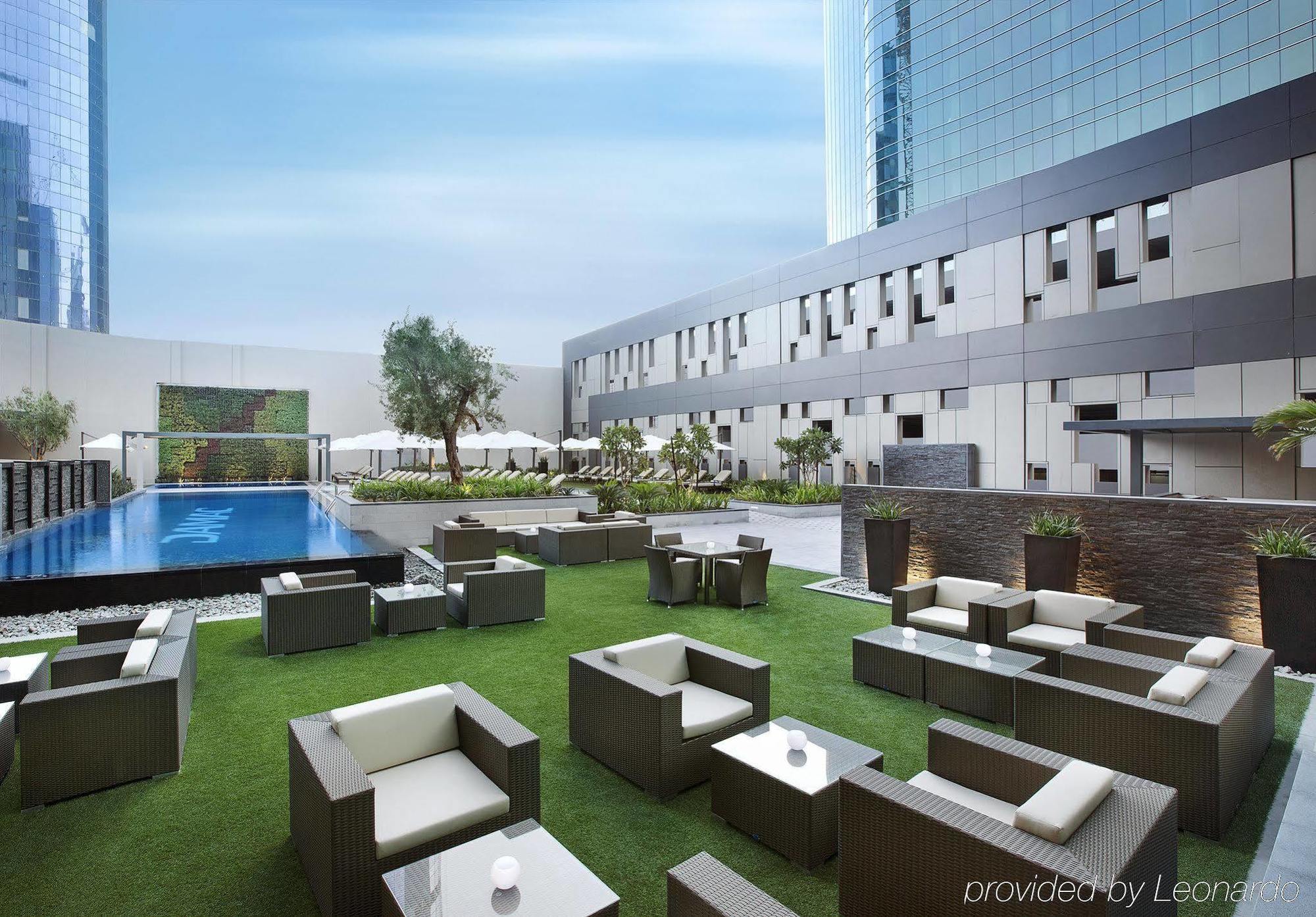 Damac Maison Cour Jardin Dubai Exterior photo The pool at the hotel
