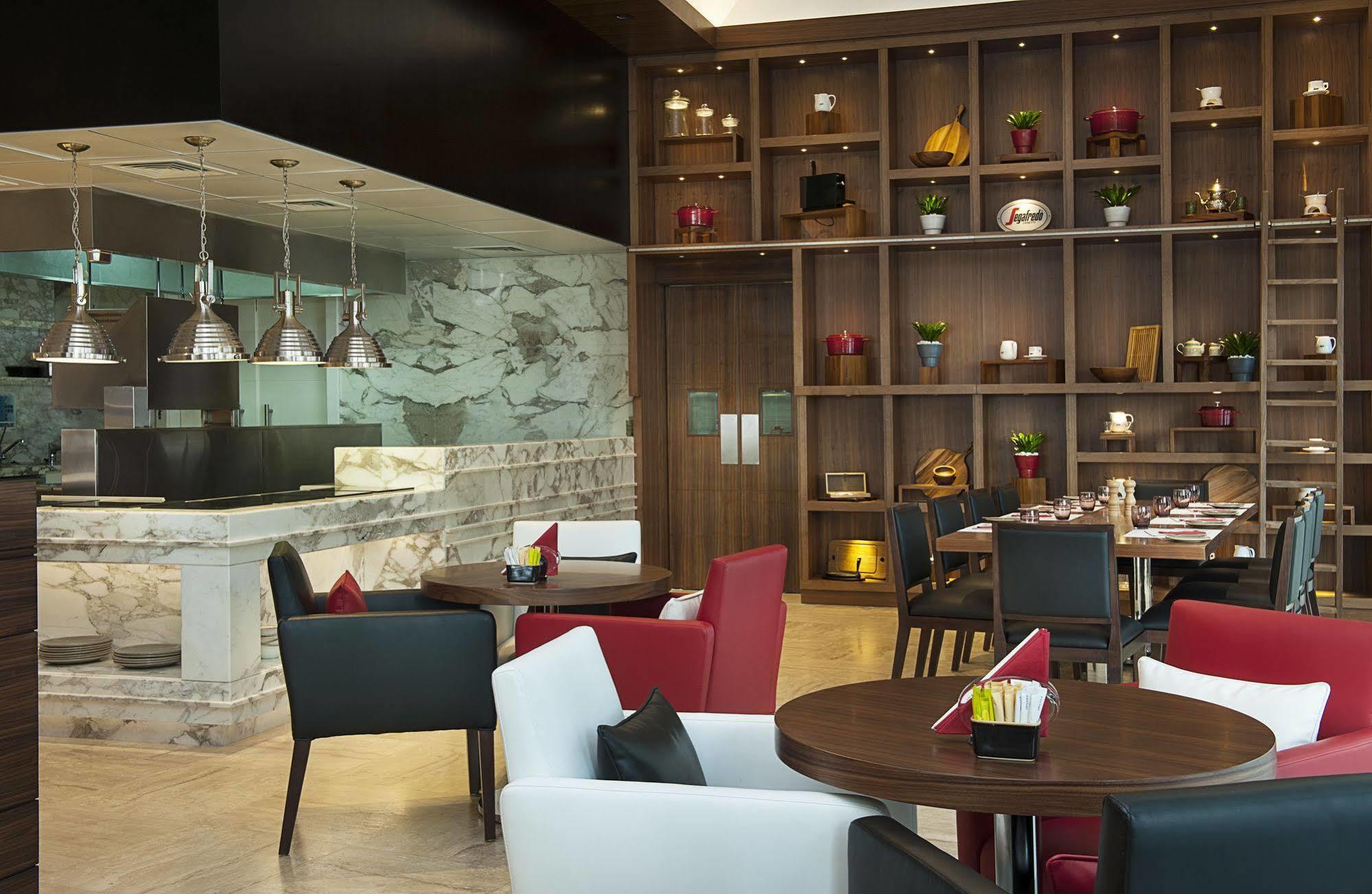 Damac Maison Cour Jardin Dubai Exterior photo The Lounge at the airport