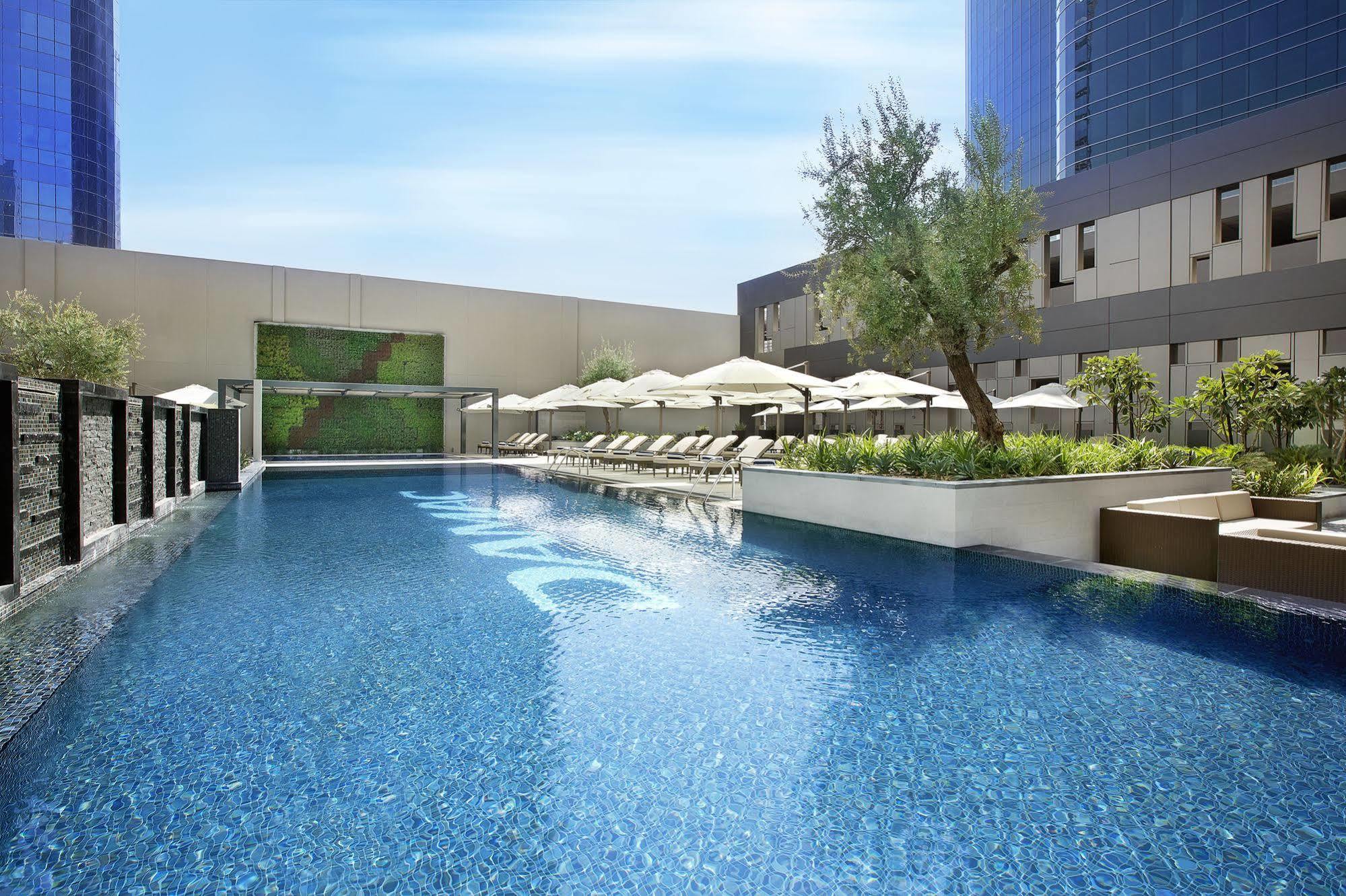 Damac Maison Cour Jardin Dubai Exterior photo The pool at the hotel